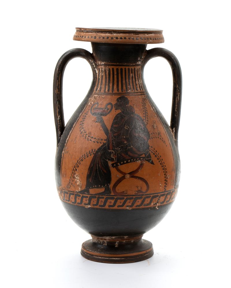 Anfora biansata in ceramica arcaica a figure nere con scena di simposio