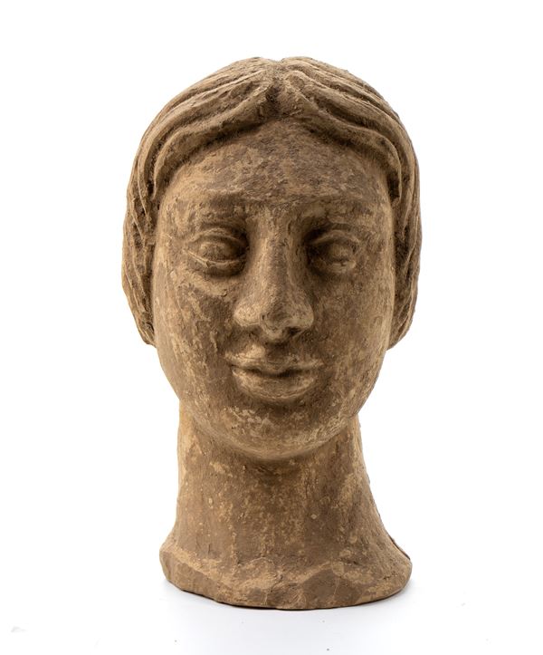 Testa muliebre in terracotta