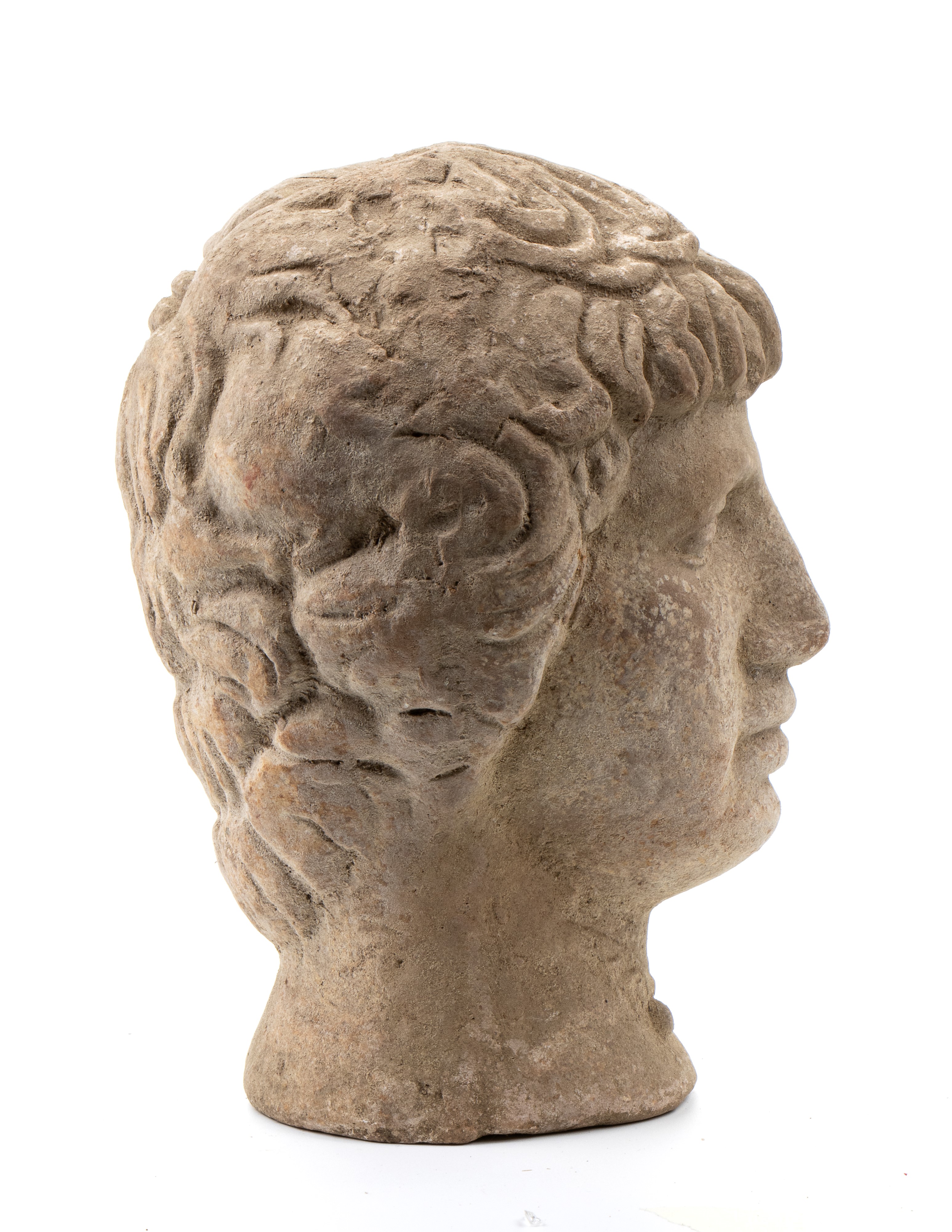 Testa di giovane in pietra