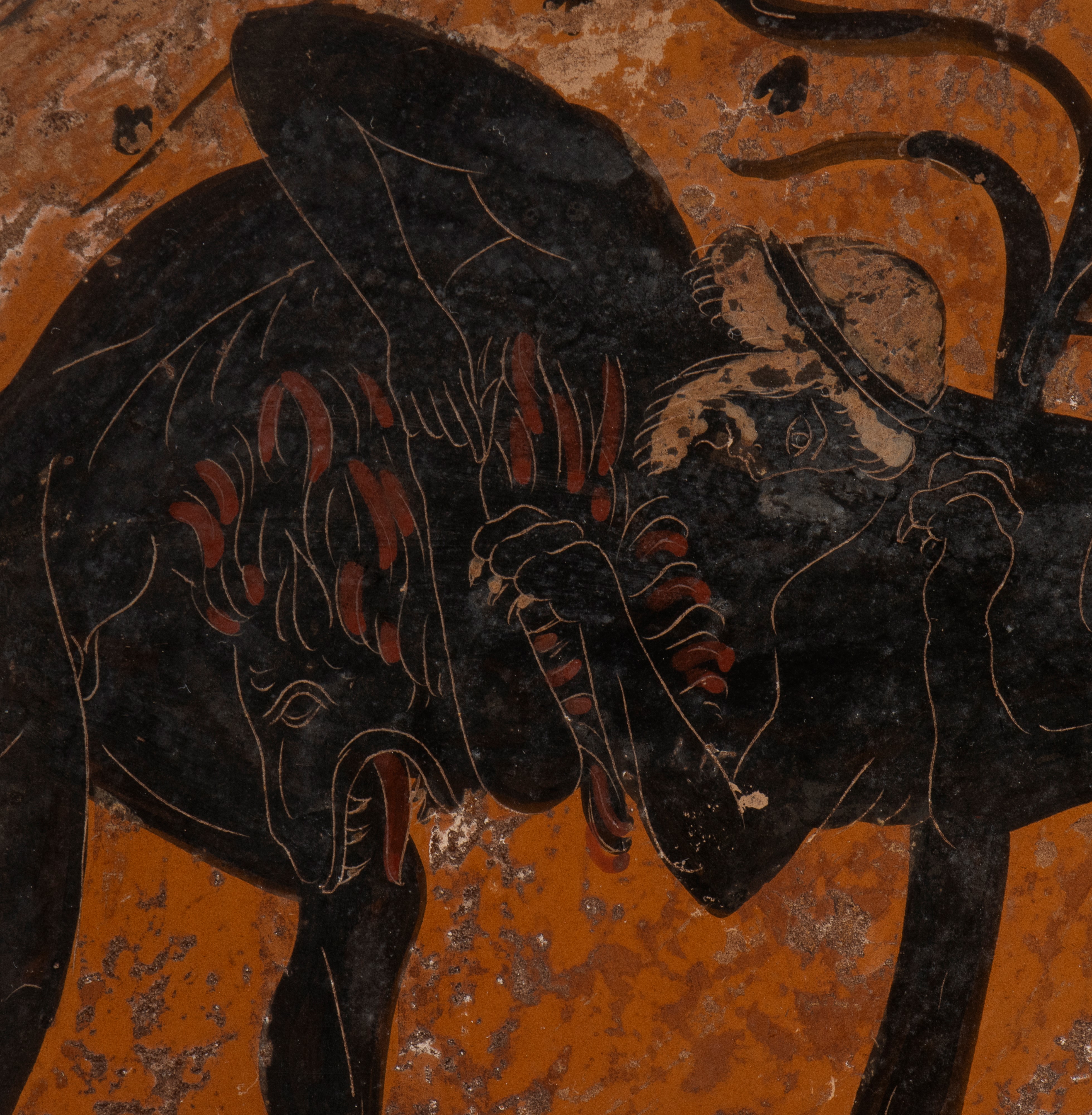 Disco in ceramica arcaica a figure nere raffigurante una delle fatiche di Ercole, ovvero la Vitto...