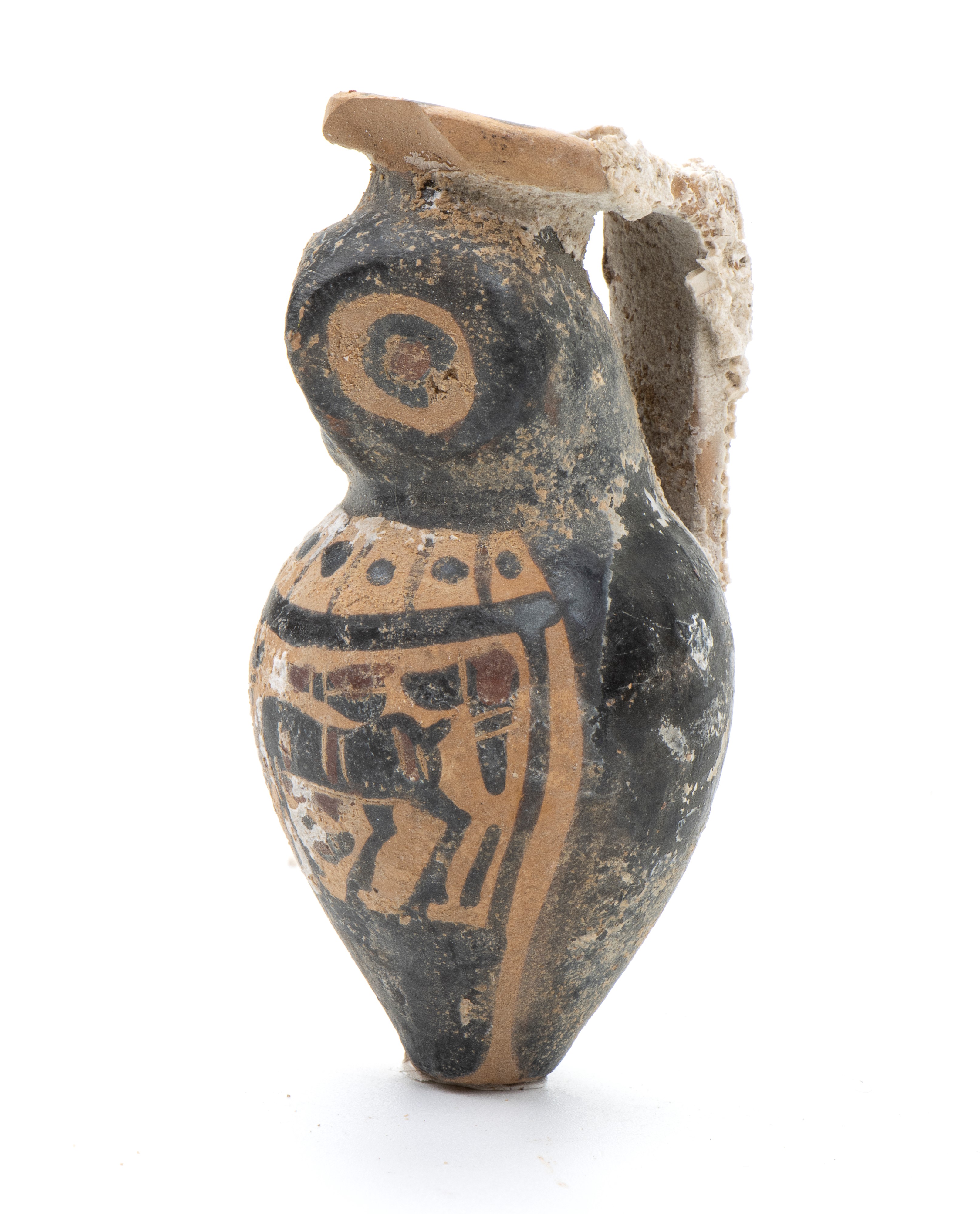 Vasetto portanguenti in ceramica arcaica a figure nere modellato a guisa di civetta