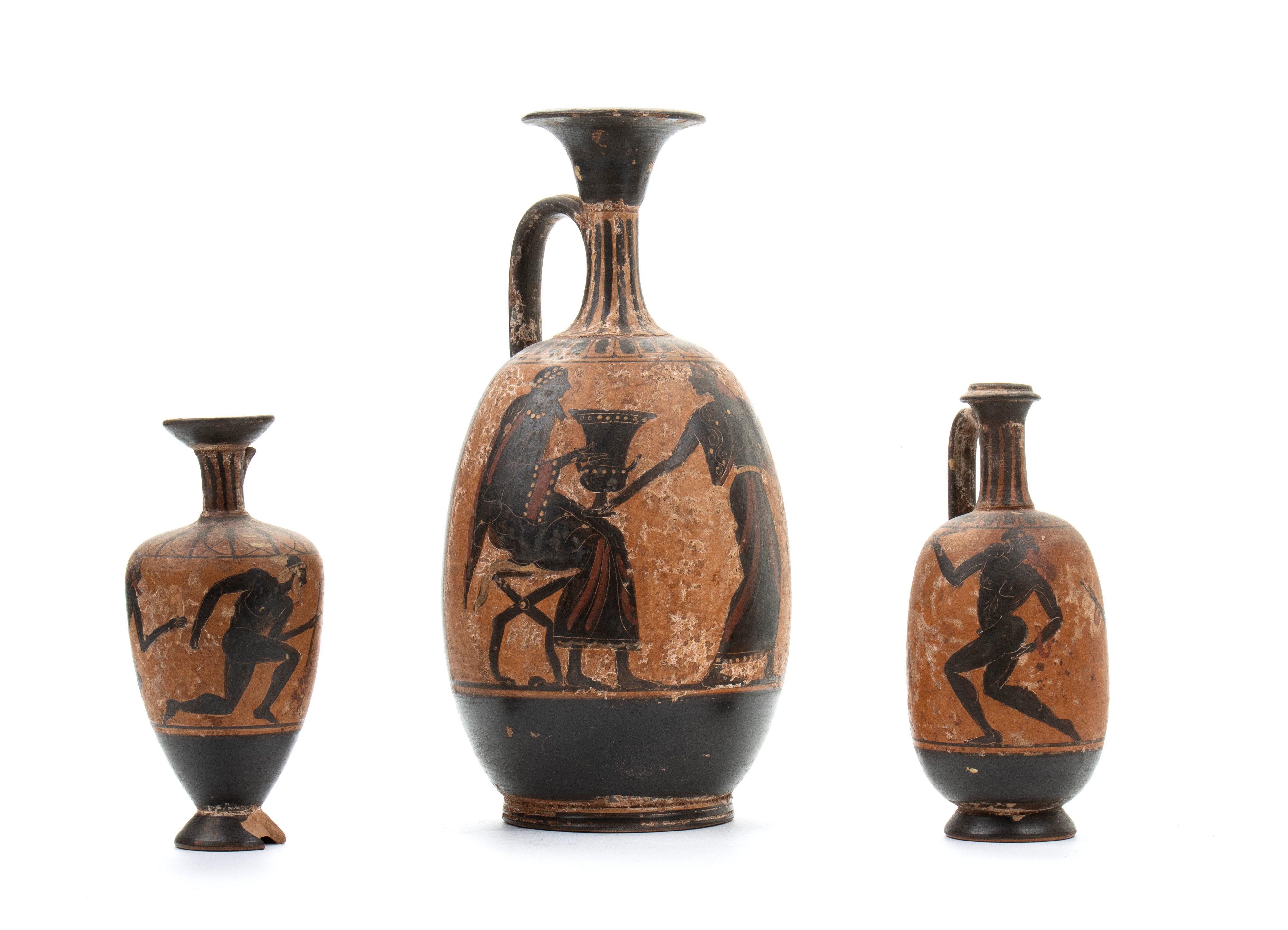 Lotto di tre oinochoe in ceramica arcaica a figure nere con figure di lottatori