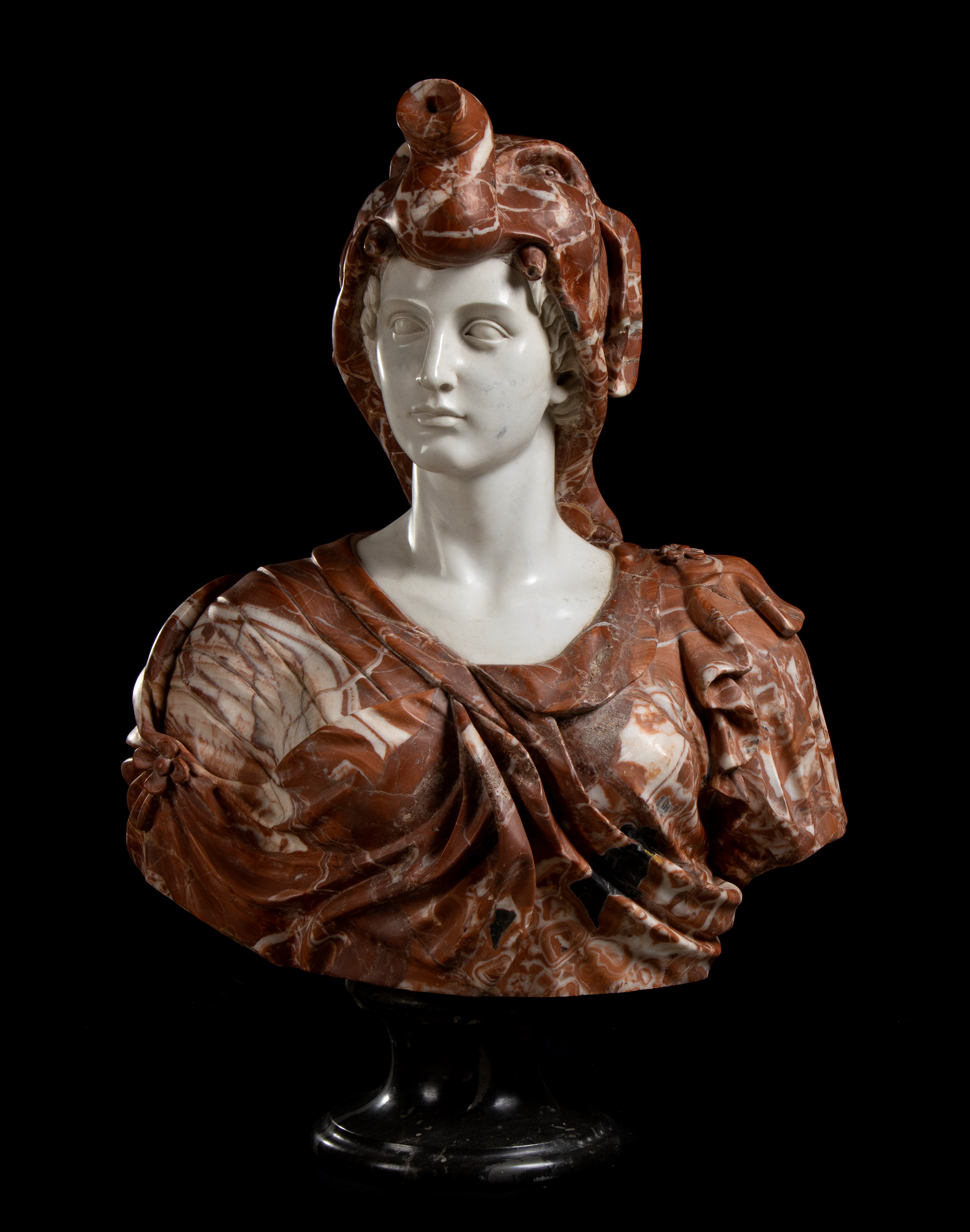 Coppia di busti in marmo rosso Asia Minore raffiguranti Alessandro Magno con copricapo di testa d...