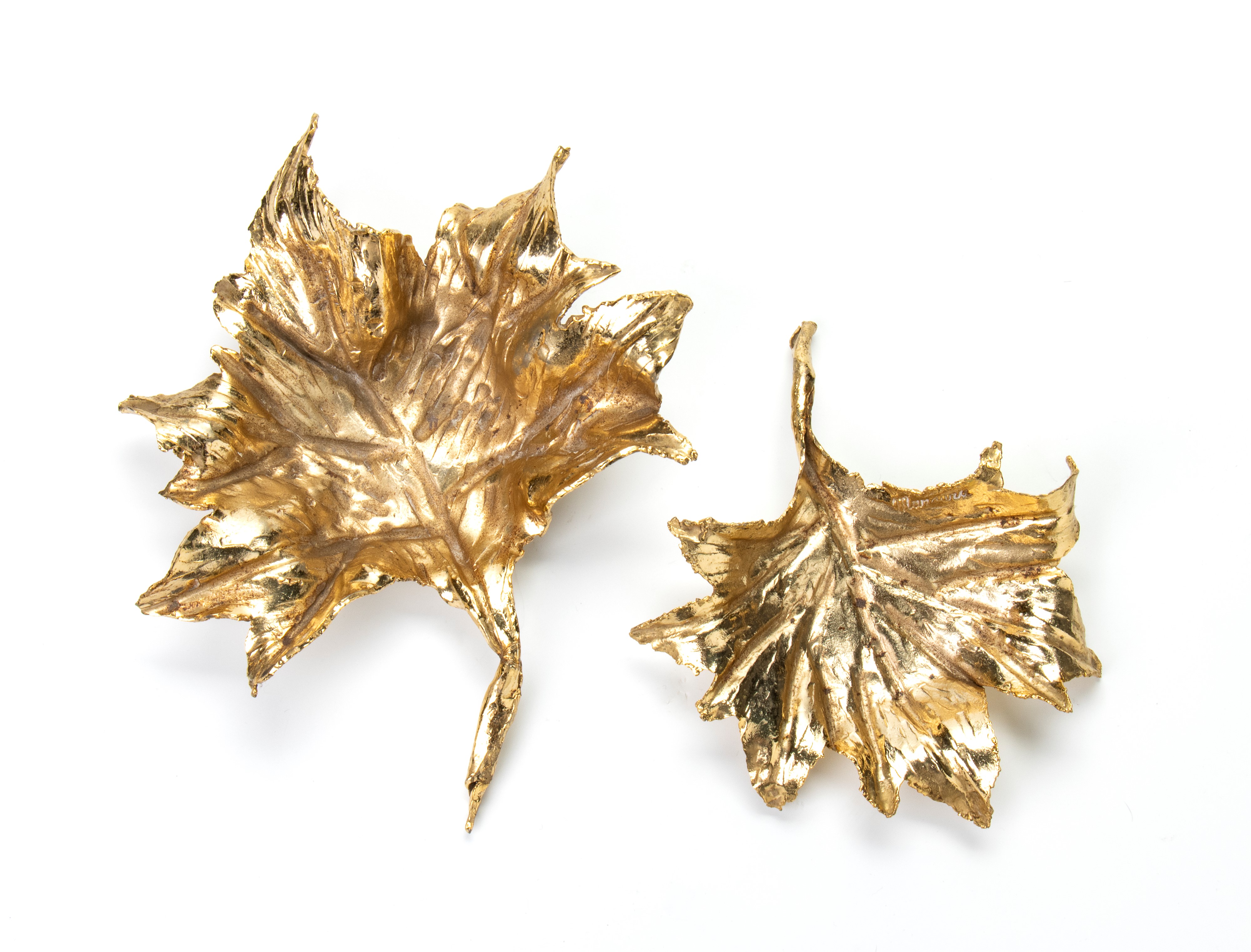 Coppia di soprammobili foglie in metallo dorato