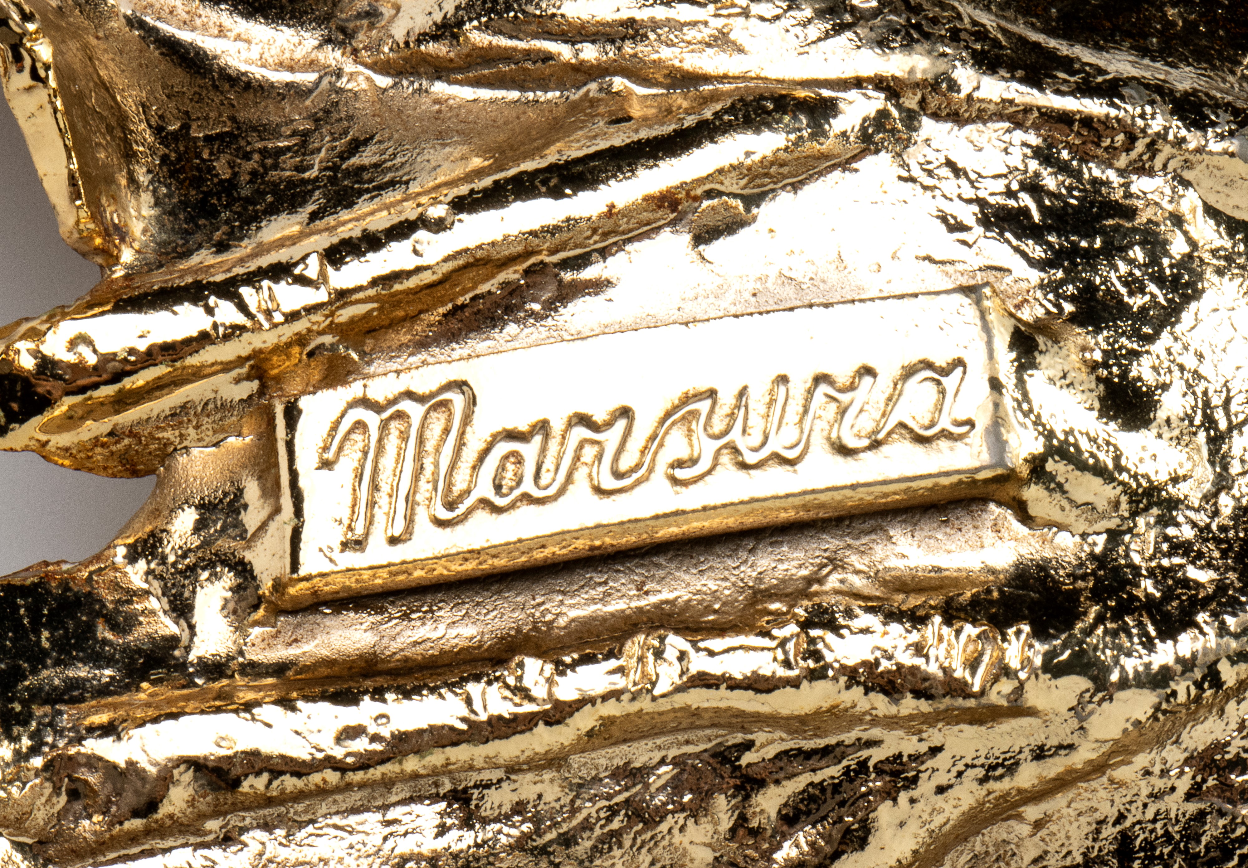 Coppia di soprammobili foglie in metallo dorato