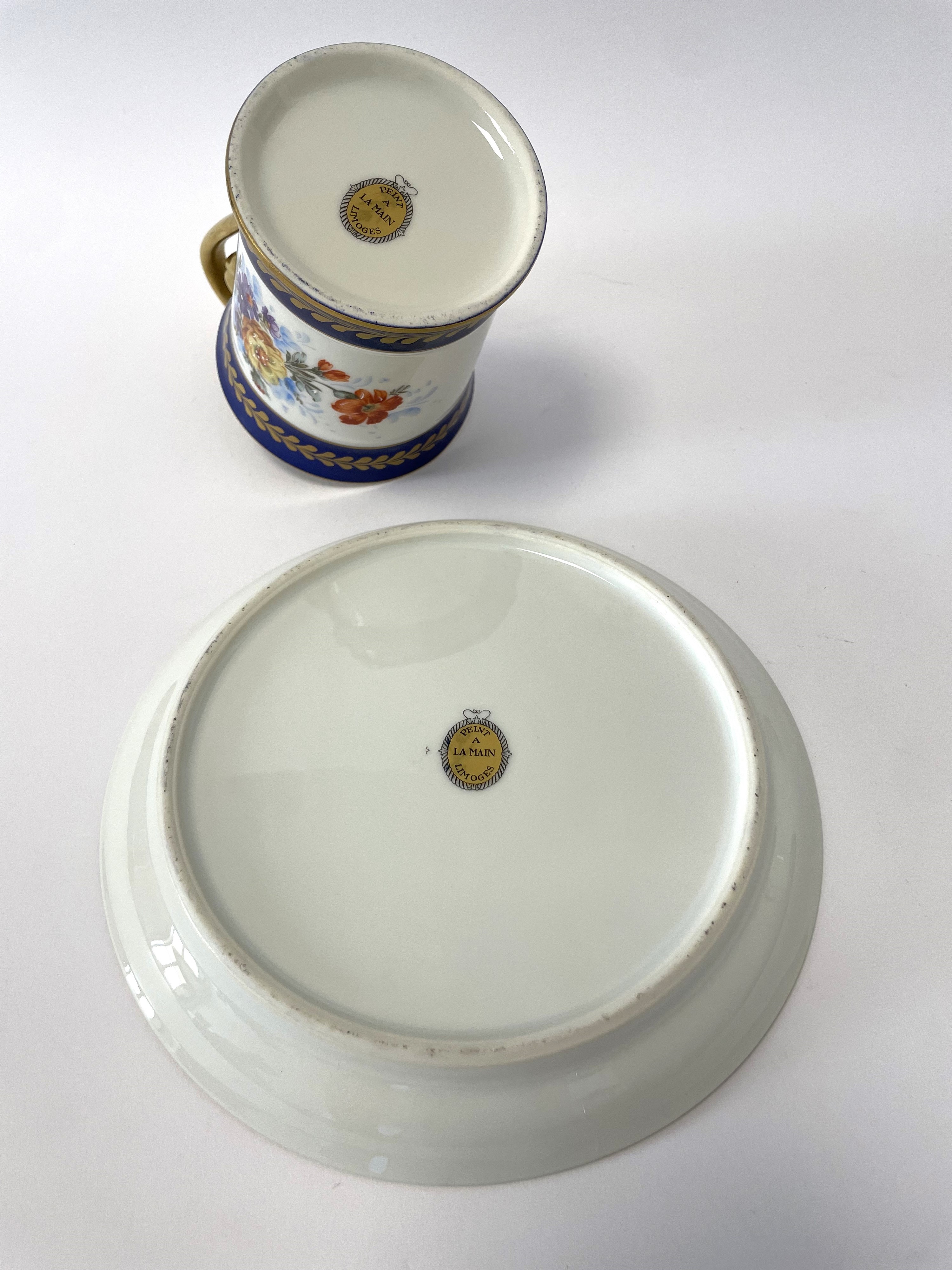 Tazza con manico e piatto in ceramica Limoges