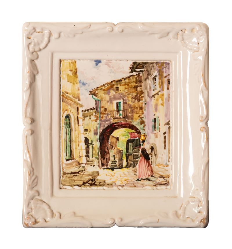 Mattonella e cornice in maiolica nei toni del bianco con istoriata una donna di Scanno in abiti t...