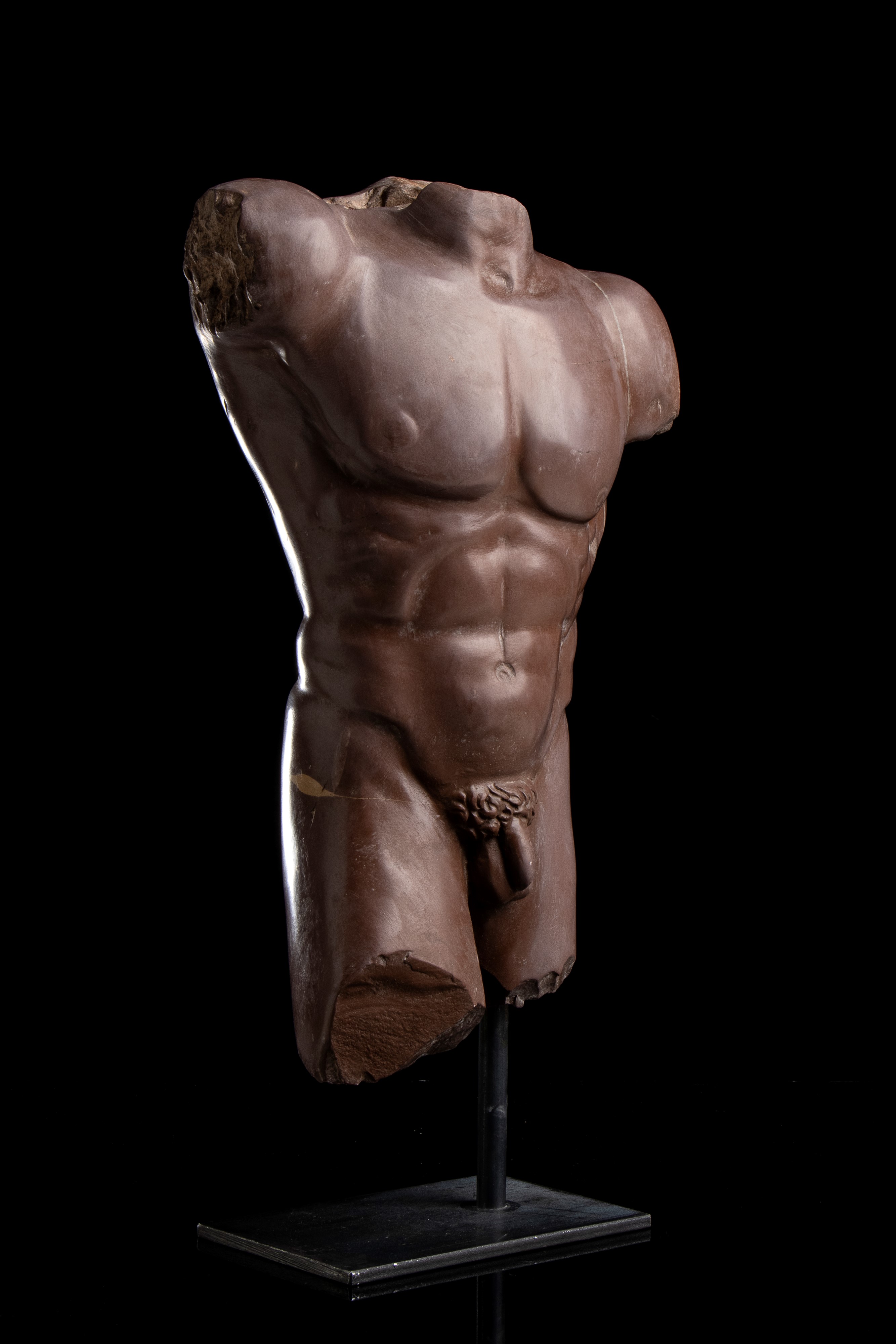 Torso in marmo rosso antico. Roma, fine del XIX - inizi del XX secolo