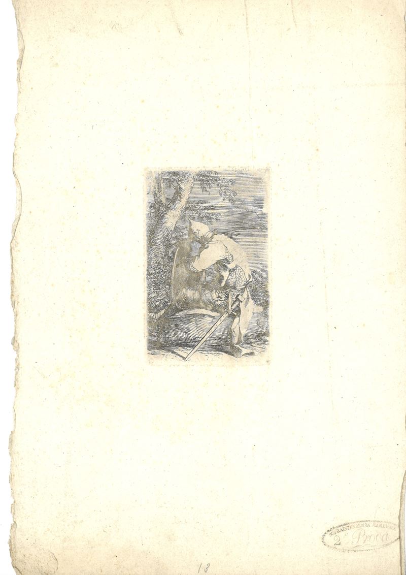 Soldato seduto appoggiato allo scudo