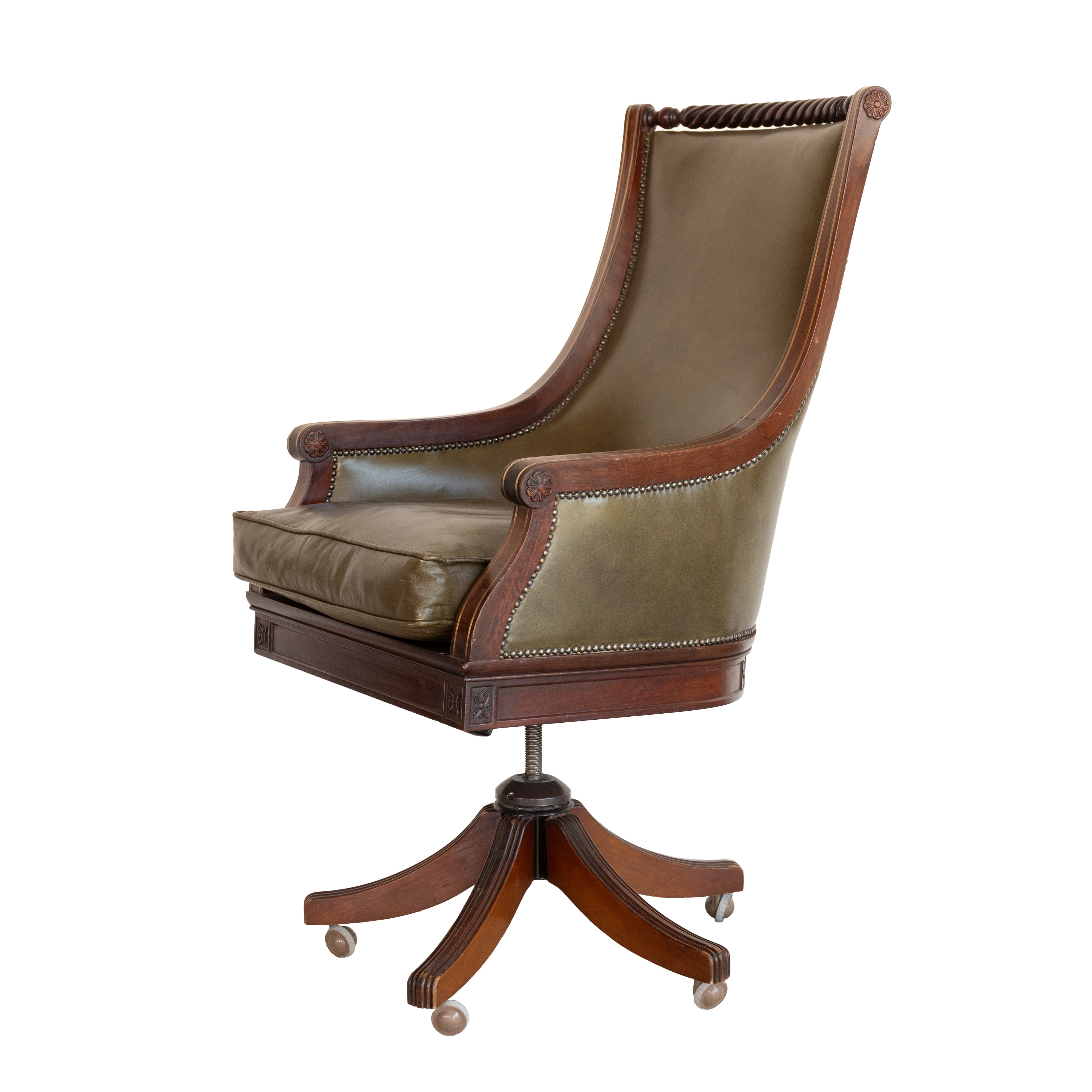 Poltrona Director in pelle verde. Inghilterra, inizi del XX secolo