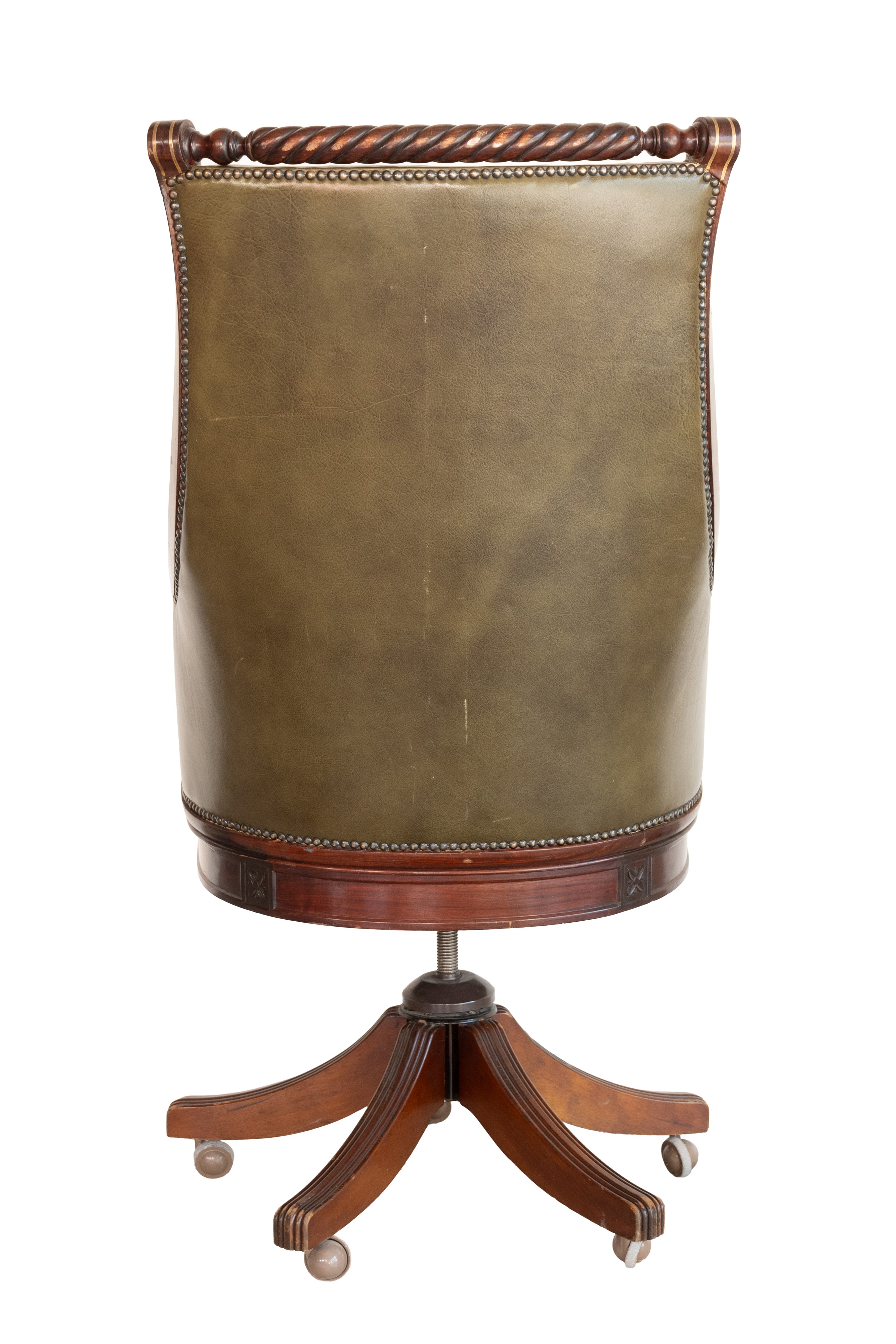 Poltrona Director in pelle verde. Inghilterra, inizi del XX secolo