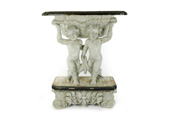 Consolle Genovese con base a putti scolpiti. 