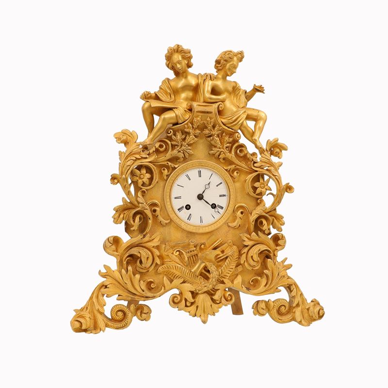 Orologio da camino in bronzo dorato