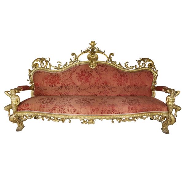 Scenografico e grande divano intagliato e dorato - Napoli