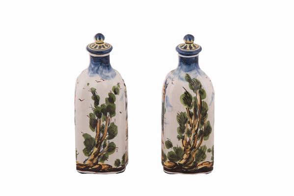 Coppia di bottiglie con tappo in maiolica 