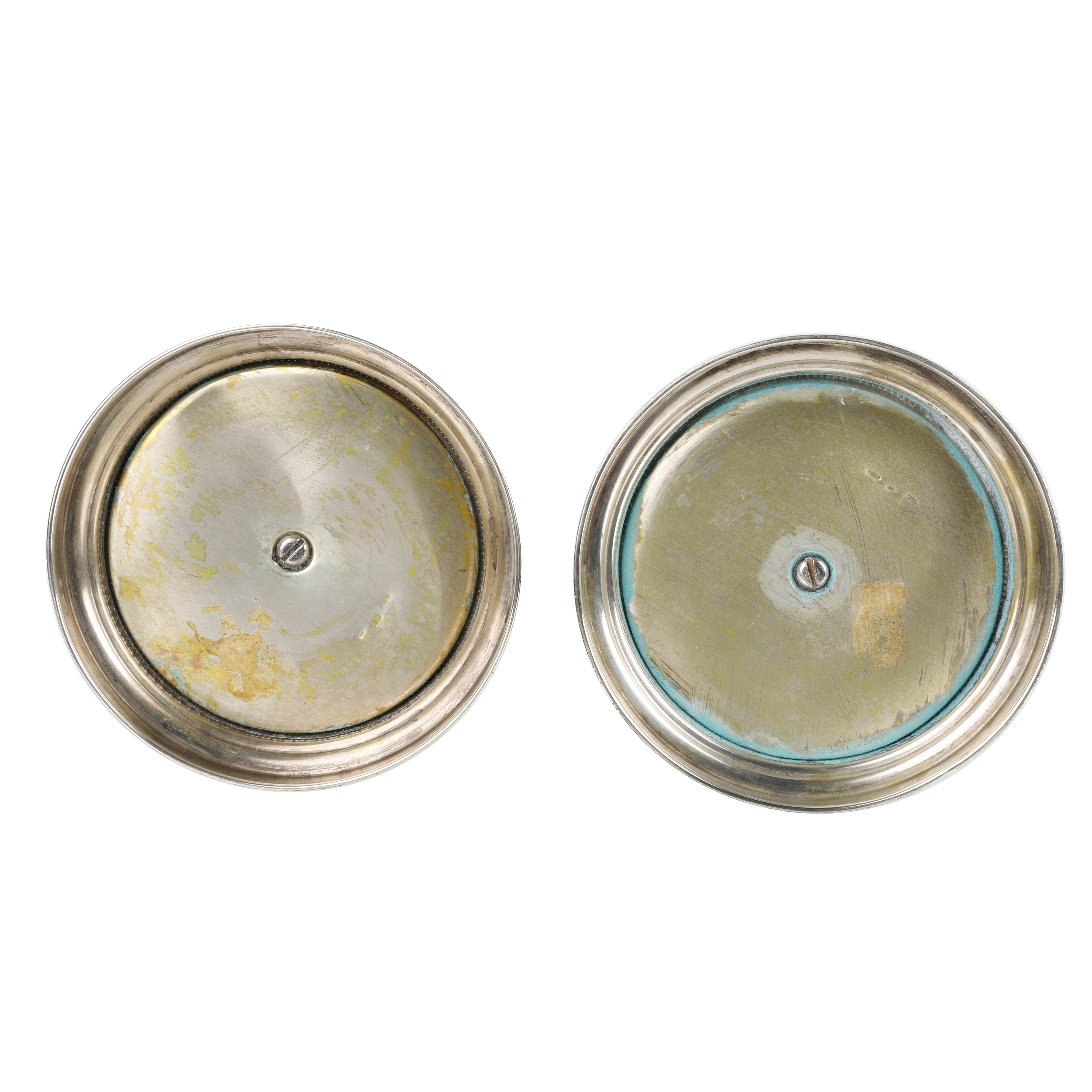 Coppia di Candelieri in Argento 800, tronco traforato