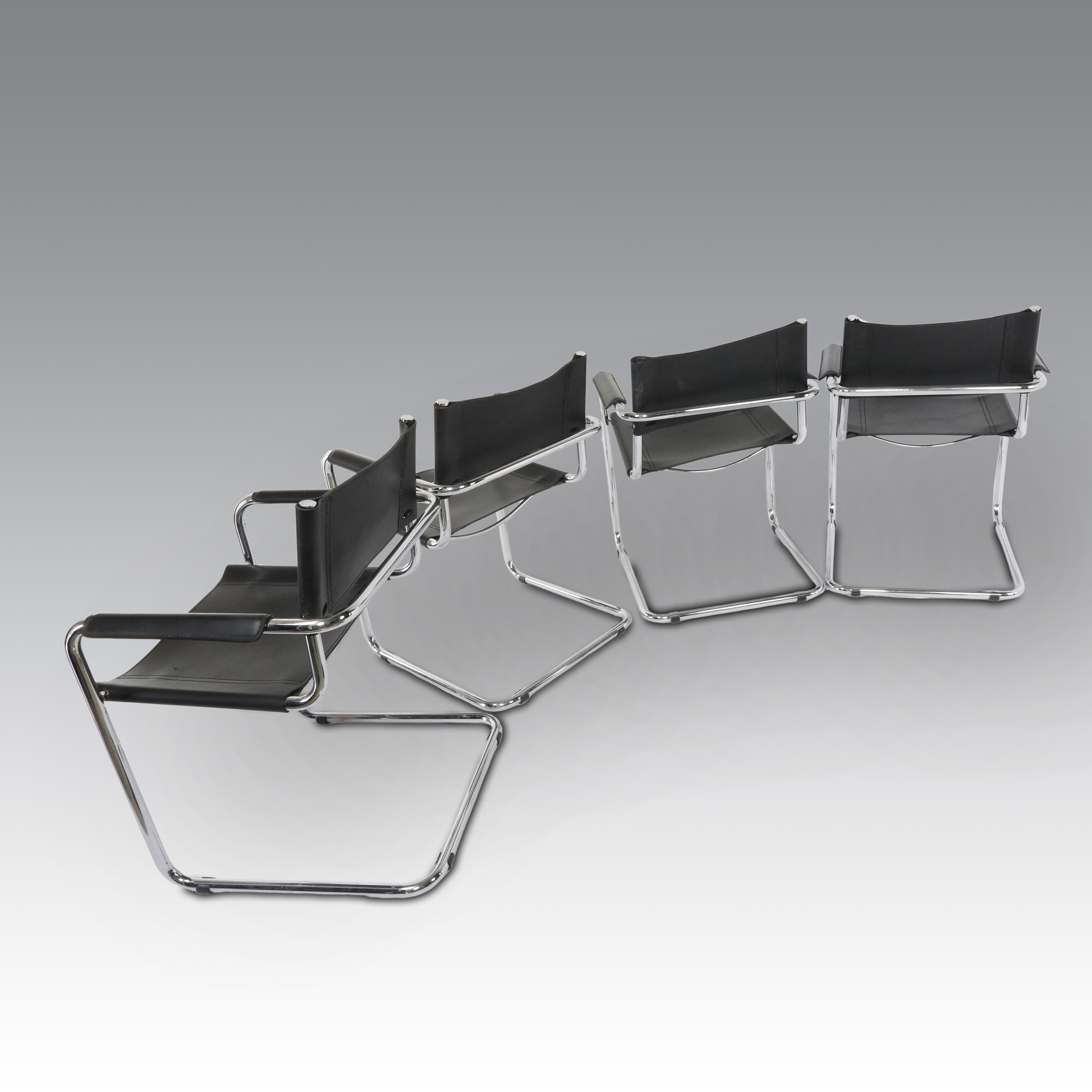 Mart Stam per Thonet, Otto sedie in pelle, modello S34 con braccioli