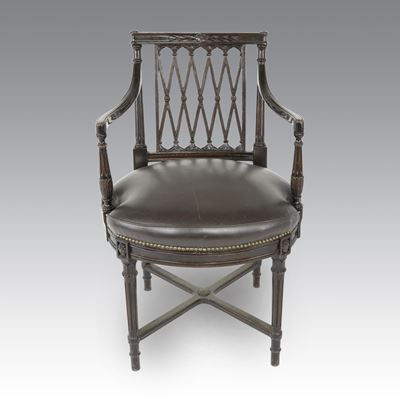 Poltroncina in stile Regency, braccioli in legno tinto nero e sedile in pelle nera