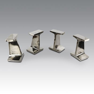 Reggi libri in metallo cromato, dalla collezione di Ralph Lauren (2014), cm 16x11x8,5