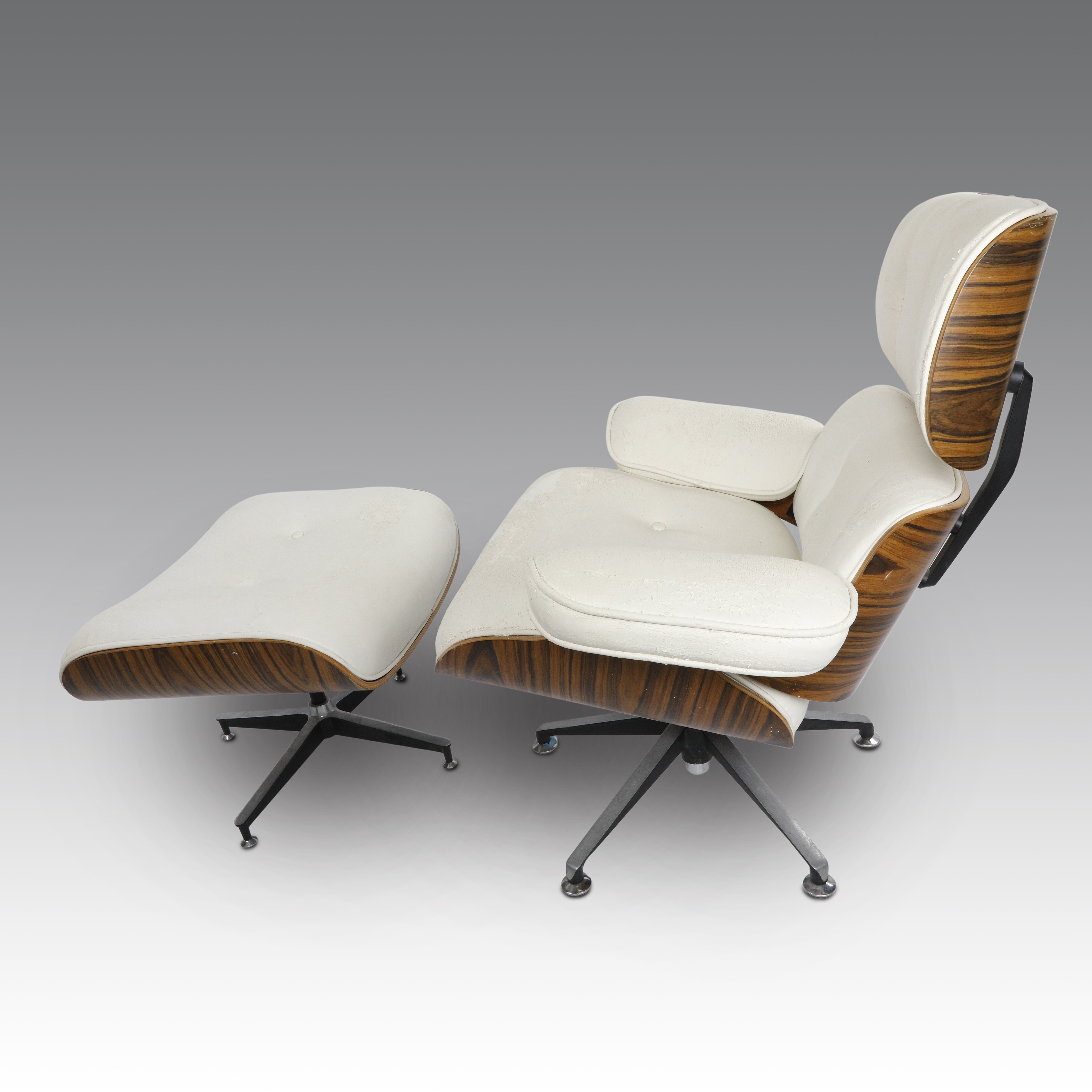 Charles & Ray Eames - Poltrona mod. 670 con poggiapiedi mod. 671