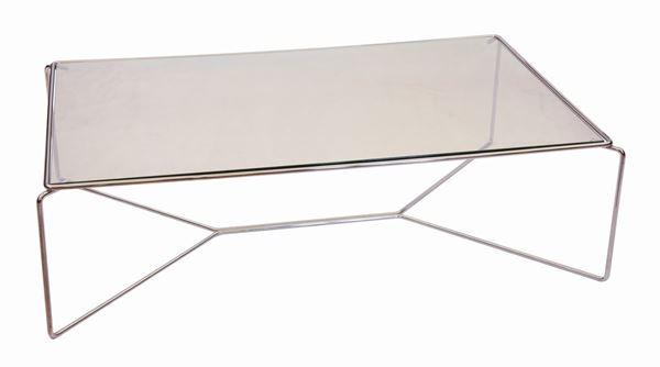 Kazuhide Takahama - Tavolo basso "Marcel 470" con struttura in tondino di acciaio trafilato cromato e piano in cristallo trasparente.