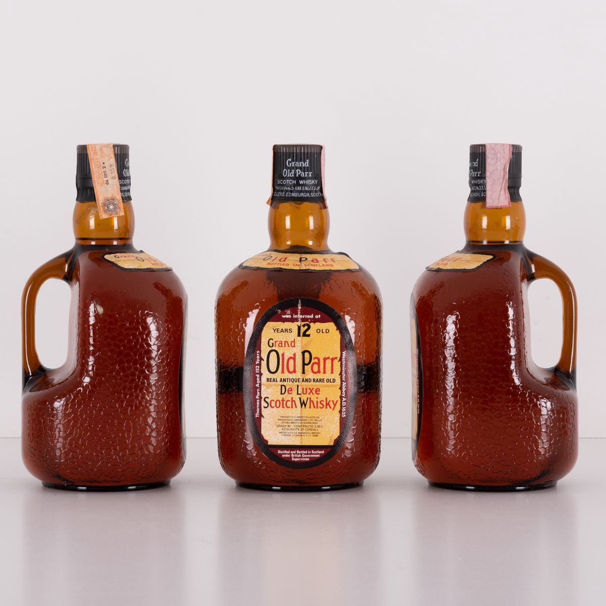 Lotto di 3 Bottiglie Grand Old Parr Deluxe Schotch Whiskey Macdonald Greenlees Ltd