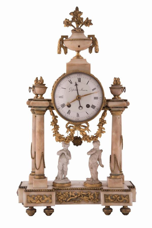 Orologio Impero da tavolo in marmo e bronzo dorato 