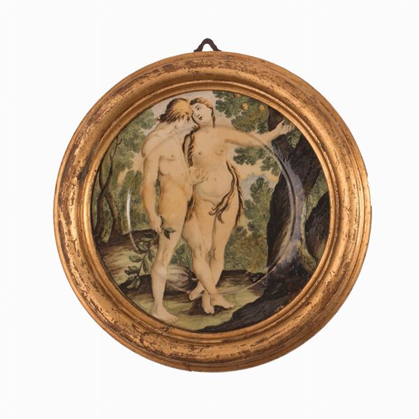 Piattino Castelli in cornice decorato in policromia con Adamo ed Eva nel Giardino dell' Eden