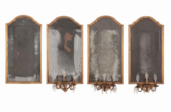 Quattro specchiere neoclassiche con appliques in legno e metallo dorato. Specchi originali al mercurio molati.