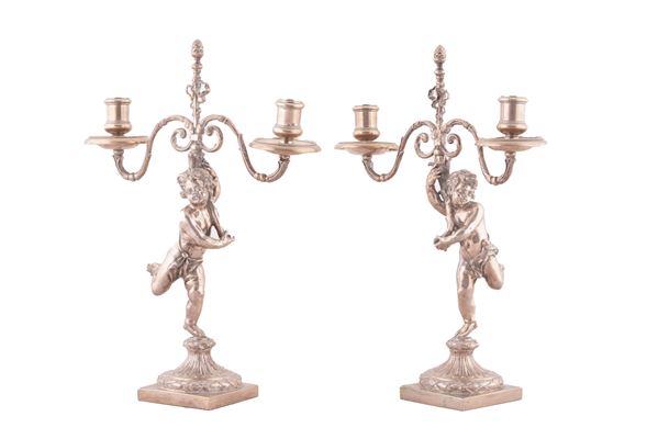 Coppia di candelieri in argento