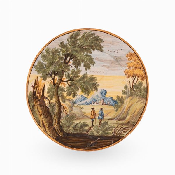Manifattura castellana del XVIII secolo - Piattello in maiolica decorato con un paesaggio agreste