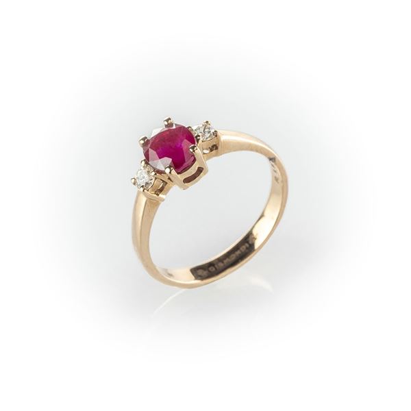Gismondi ring in rose gold with oval-cut central ruby surrounded by two brilliant cut diamonds on the stem