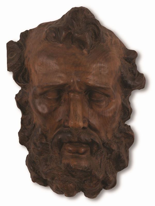 Manifattura romana della fine del XVIII secolo - Bassorilievo in legno brunito raffigurante testa di San Pietro
