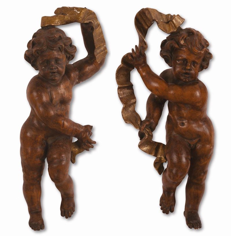 Manifattura Romana del XVII Secolo - Coppia di Sculture Lignee Raffiguranti Putti Reggifestoni Do...