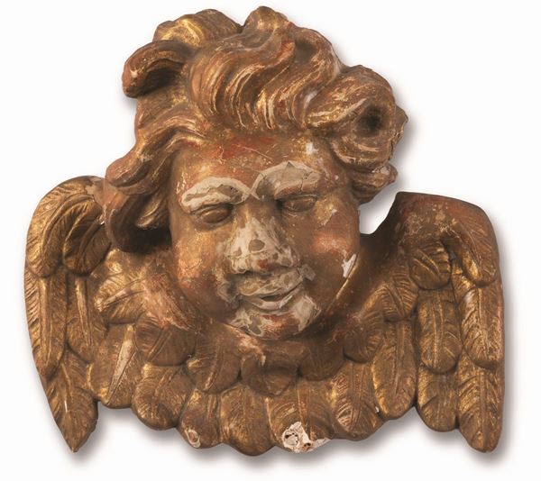 Manifattura dell'Italia centrale - Scultura in legno dorato raffigurante volto di cherubino