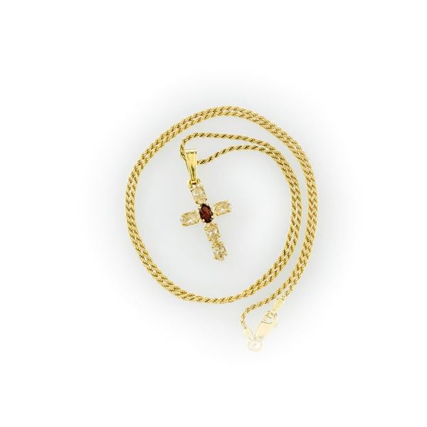 Necklace in yellow gold 18 kt with cross pendant with diamonds and a central ruby oval cut
