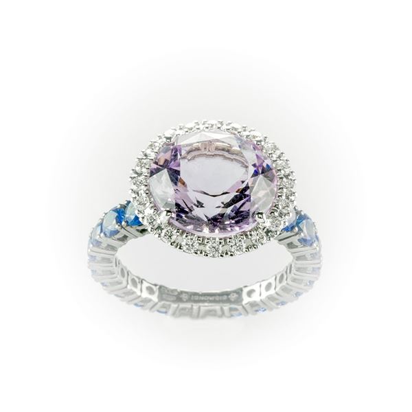 Gismondi white gold ring with large central amethyst surrounded by brilliant cut diamonds and ring made of blue sapphires