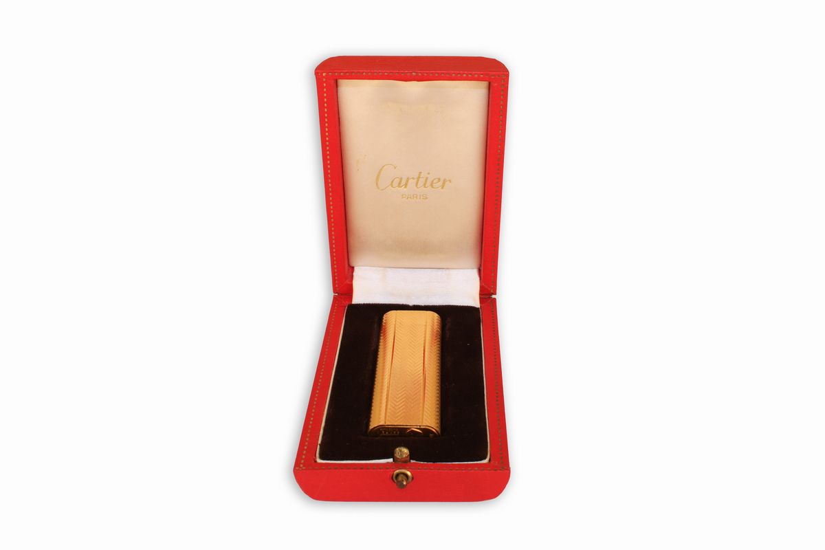 Accendino Cartier Laminato in Oro con Motivo Zigrinato