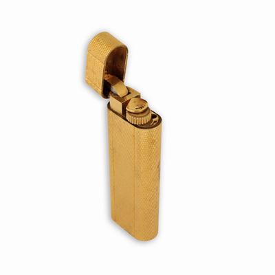Accendino Cartier Laminato in Oro con Motivo Zigrinato
