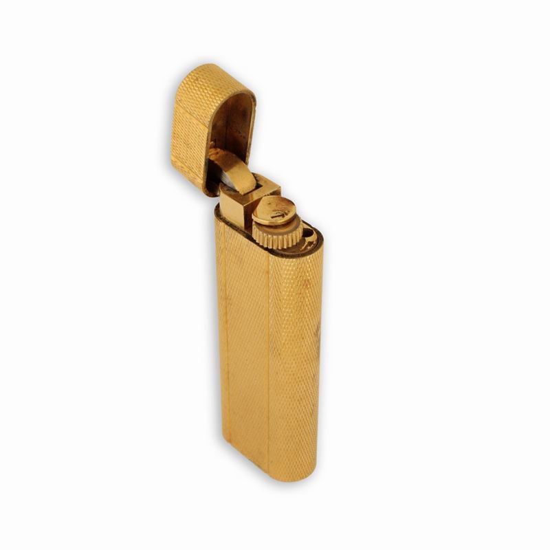 Accendino Cartier Laminato in Oro con Motivo Zigrinato