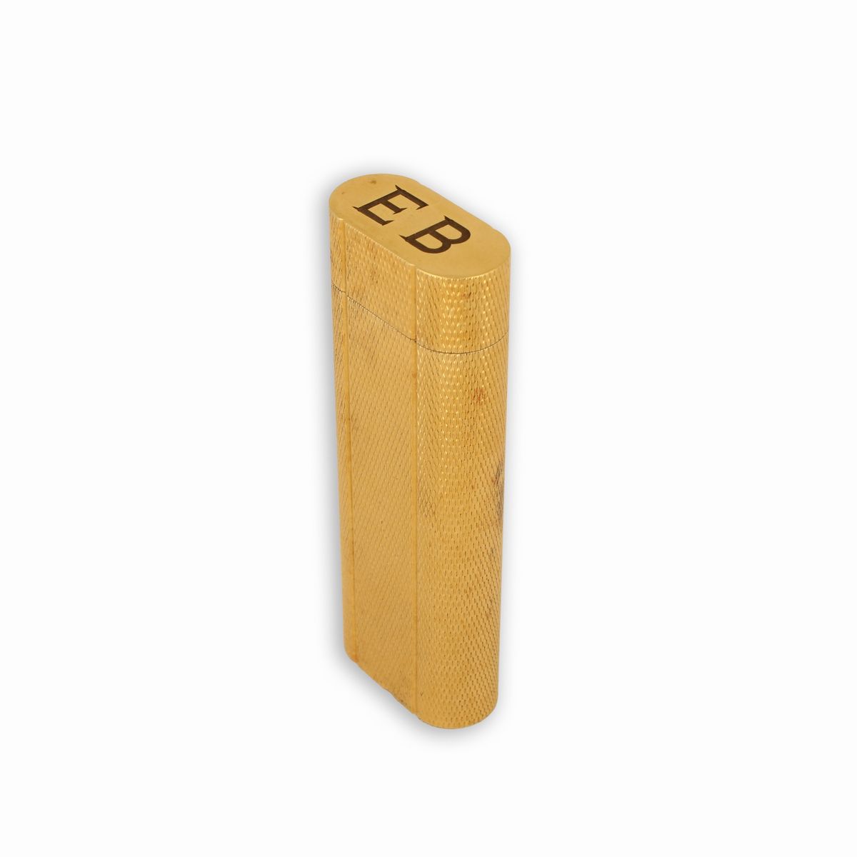 Accendino Cartier Laminato in Oro con Motivo Zigrinato