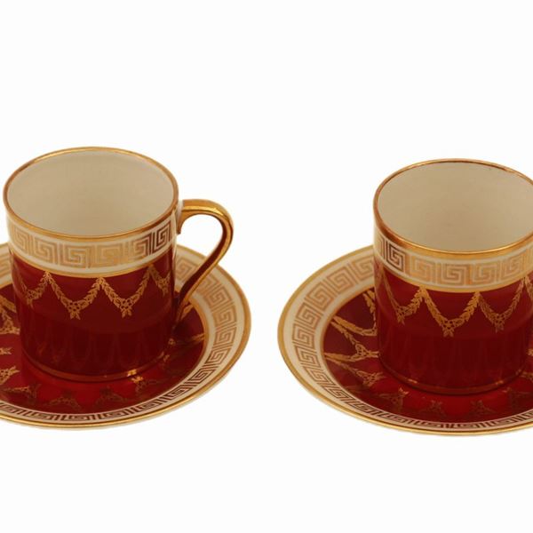 Coppia di tazzine Sevres rosse e oro