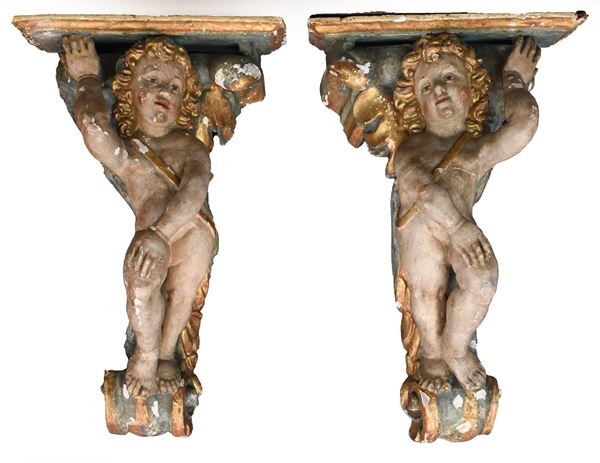Manifattura romana del XVII secolo : Coppia di mensole in legno scolpito e dorato con angeli  - Auction Asta 19: Oggetti d'arte, argenti e dipinti antichi - Gliubich Casa d'Aste