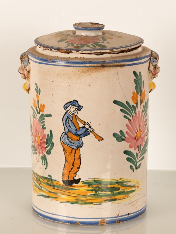 Vaso da strutto con mascheroni urlanti policromi a rilievo. Decori al fioraccio e zampognaro. Manifattura Castelli, XIX secolo