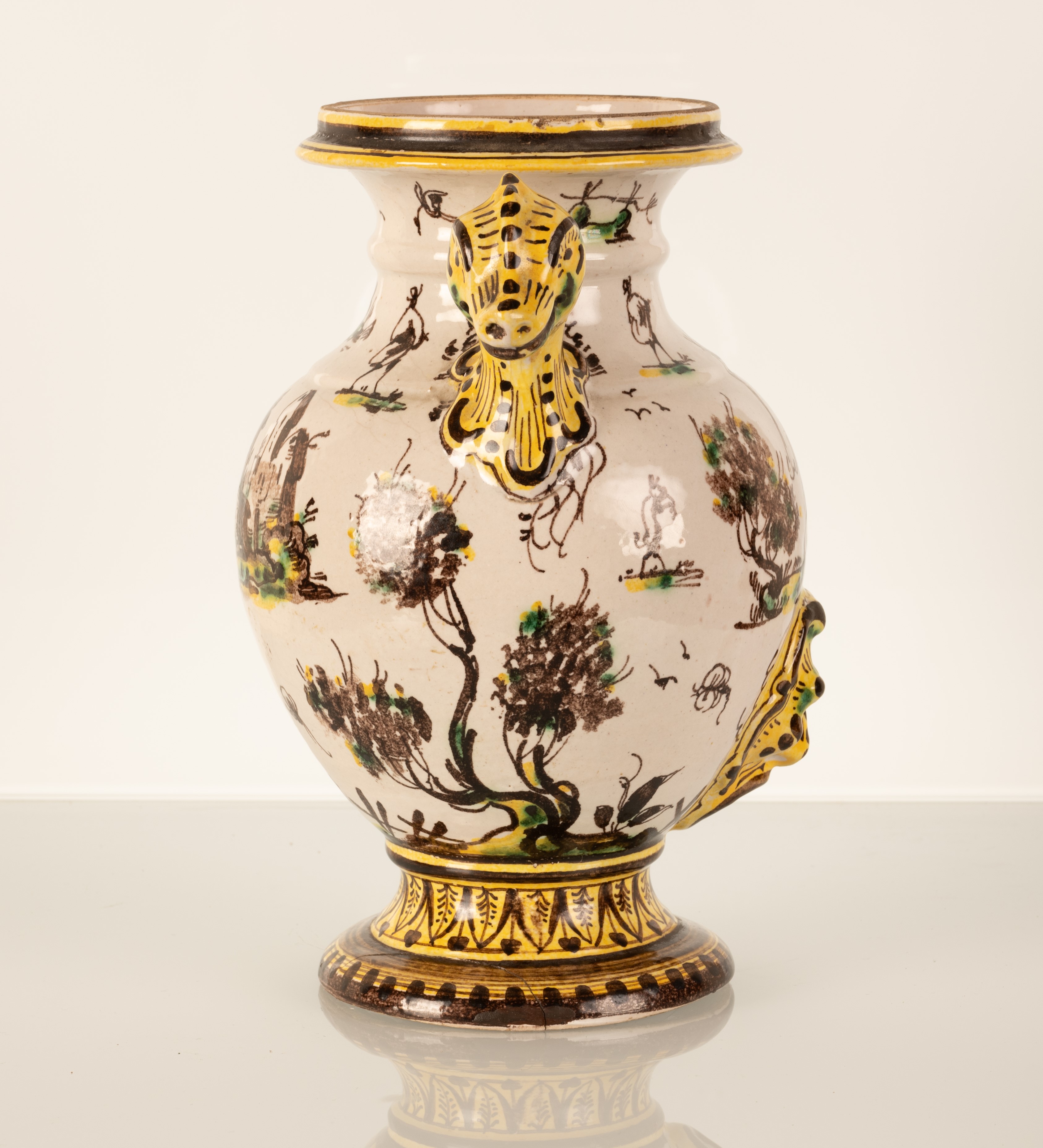 Vaso in maiolica biansato con anse modellate a forma di animali fantastici. Manifattura Savona, f...