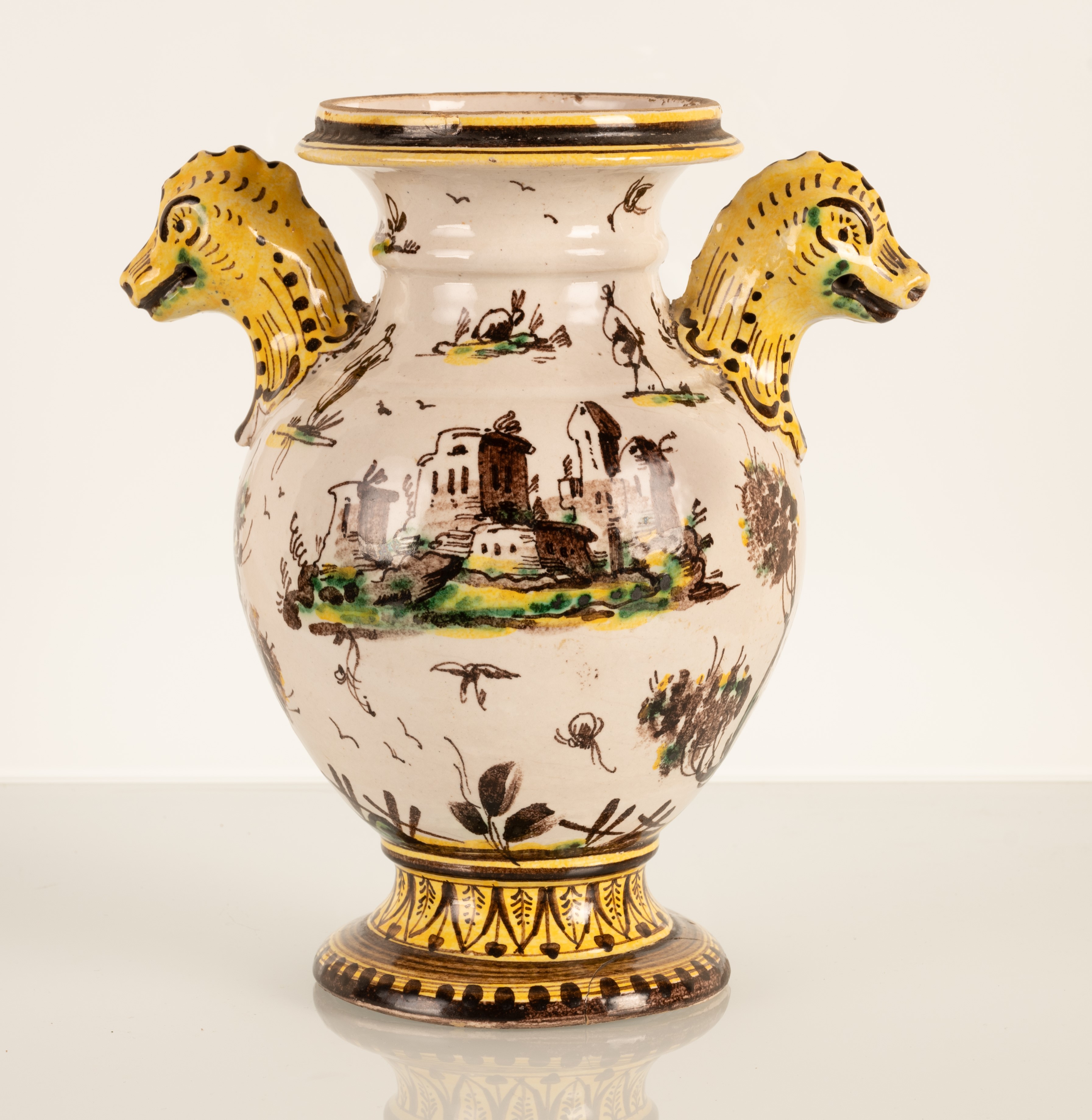 Vaso in maiolica biansato con anse modellate a forma di animali fantastici. Manifattura Savona, f...