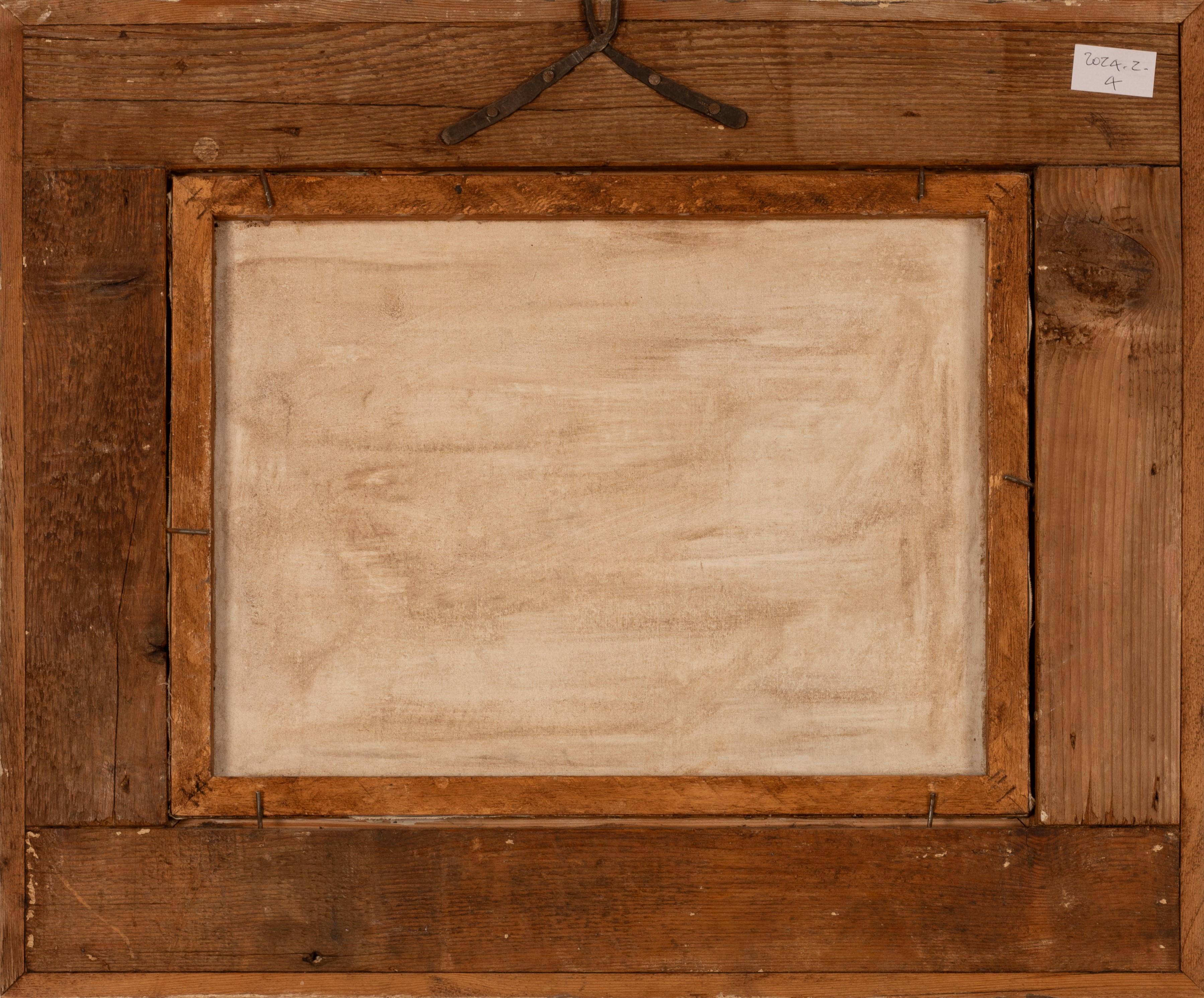 Nudo di giovane donna di spalle con paesaggio marino sullo sfondo