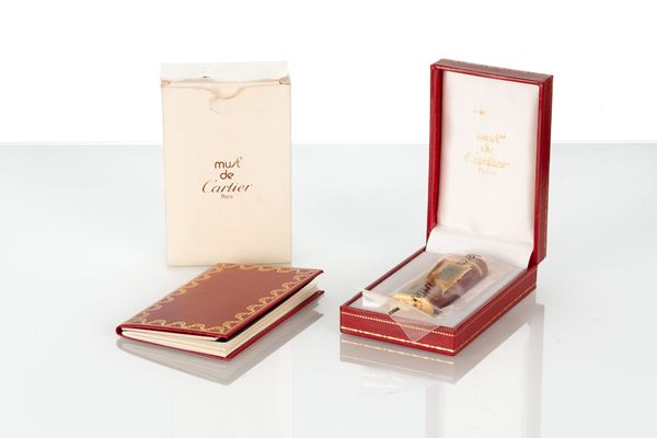 Accendino Must de Cartier in lacca bordeaux