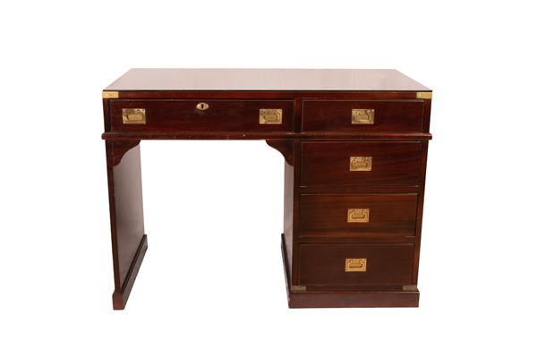 Byron marine style mahogany desk with five drawers on the front and glass top
