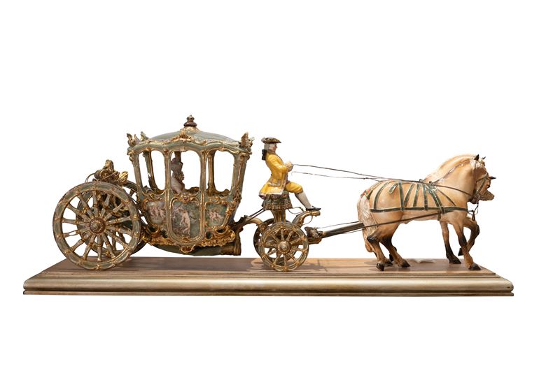 Grande scultura in porcellana policroma raffigurante Dama in una carrozza, cocchiere e due cavall...